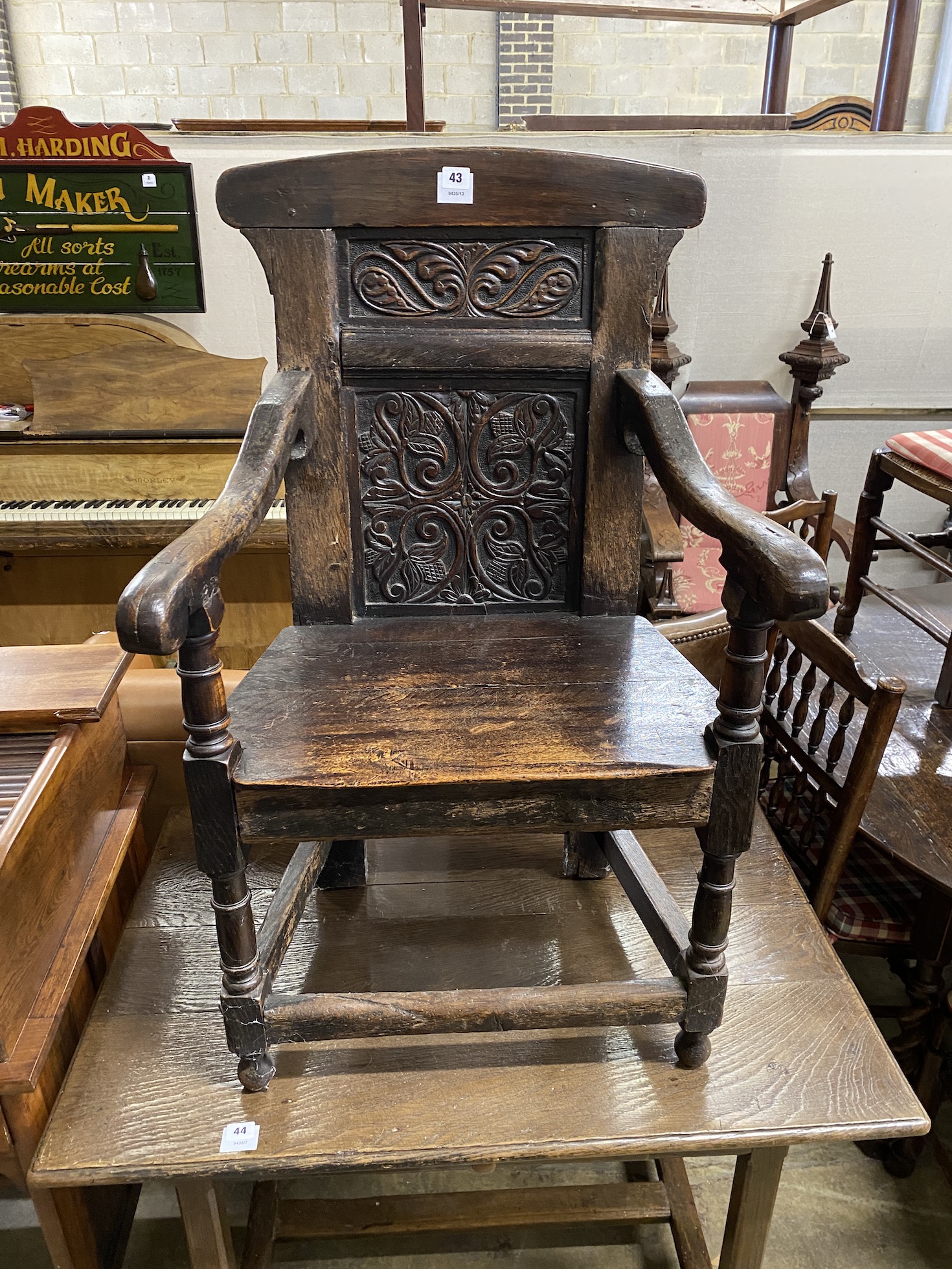 A 17th century and later oak carved Wainscot chair, width 57cm, depth 51cm, height 99cm